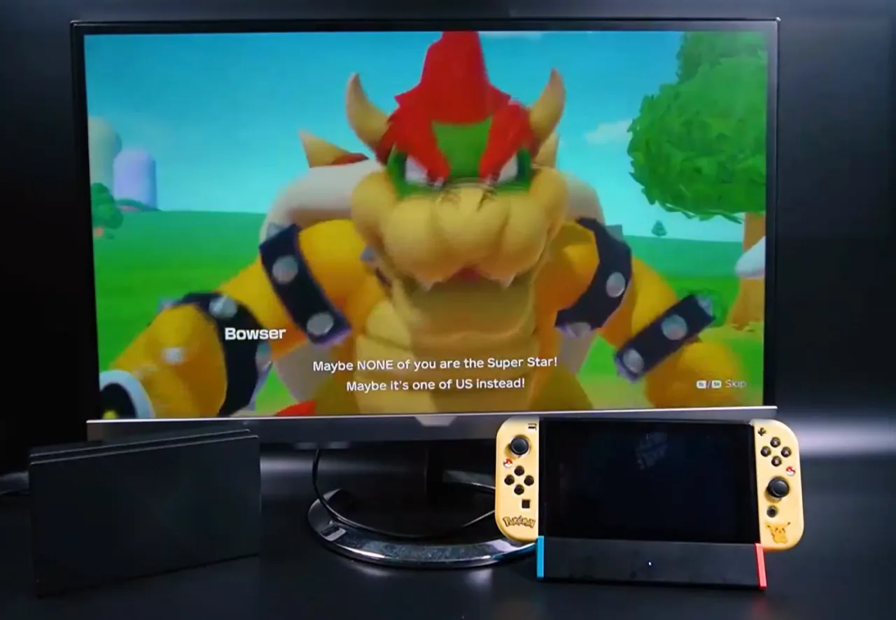 Nintendo Switch docked in a red-and-blue SiWiQU dock below a monitor showing gameplay